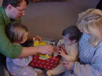 me-12-25-rowans-first-present-2