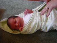 pe-06-26-swaddled